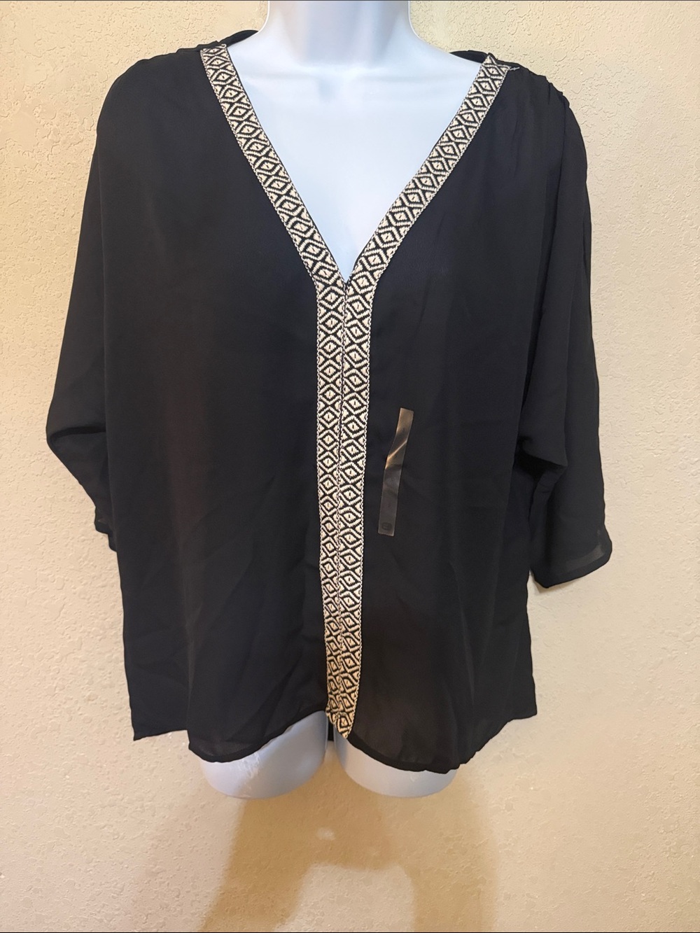 Buckle Black V-Neck Blouse with Cream Geometric Trim
